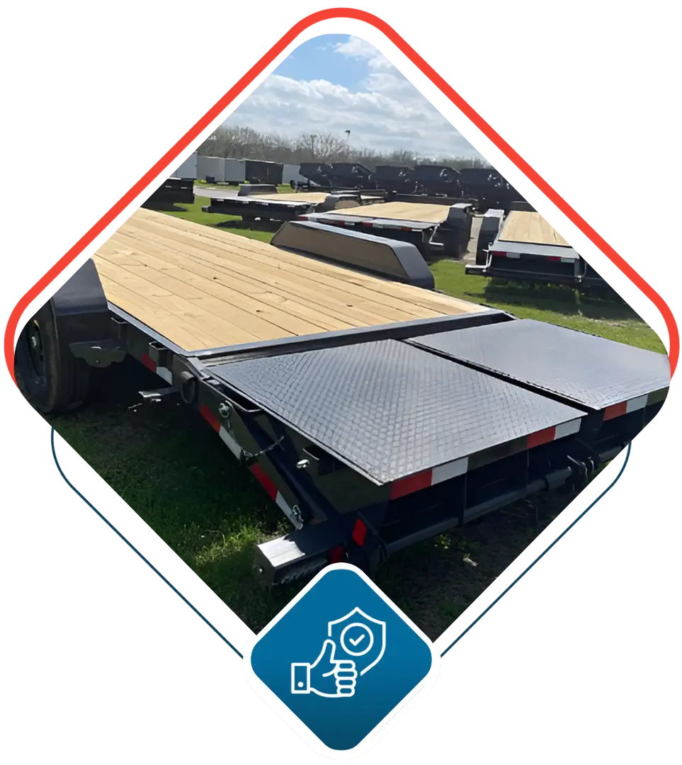 Flatbed trailers displayed outdoors, sunny day.